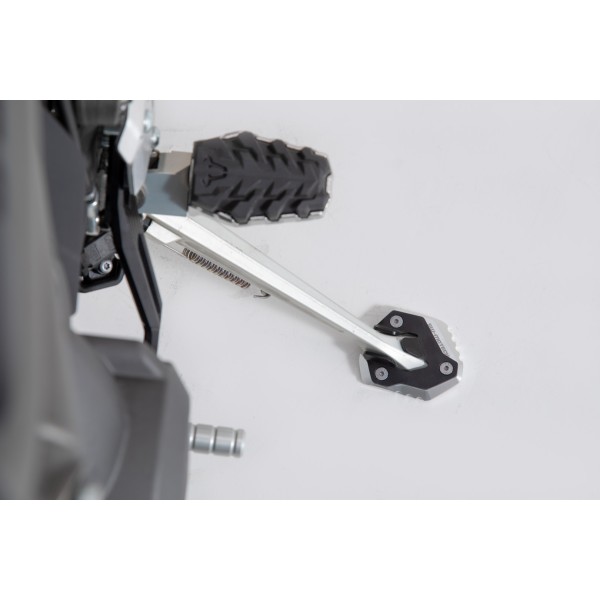 Extension para caballete lateral Negro/plateado. Modelos Tiger 800 XC/XR (17-).